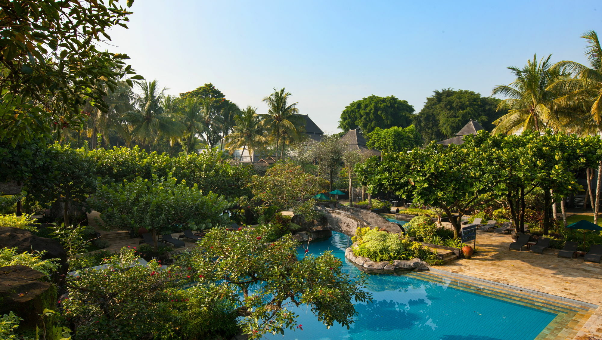 Hyatt Regency Yogyakarta Hotell Sleman  Exteriör bild The pool at the Royal Villa